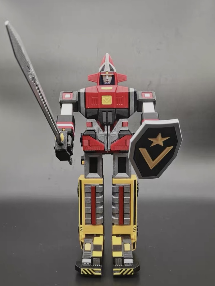 3D-printed Goggle Robo front view with sword and shield