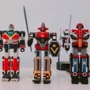 Goggle Robo shown with other 3D-printed combining robots for size comparison