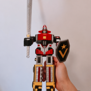 3D-printed Goggle Robo holding a sword and shield