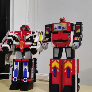 Galaxy Robo and Great Five Maskman robot figures side by side