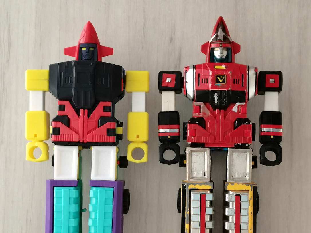3D-printed robot displayed beside the original vintage robot for comparison